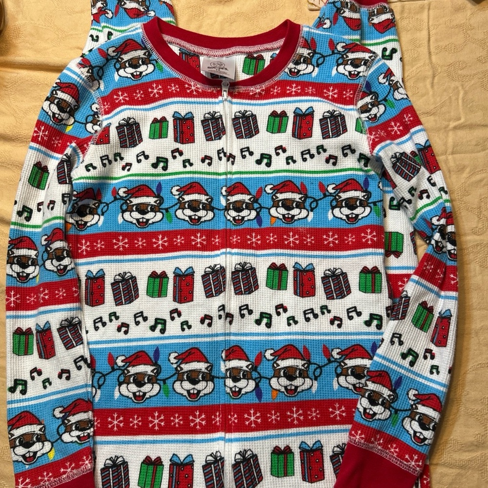 Festive Kids Pajama Set with Santa and Gifts